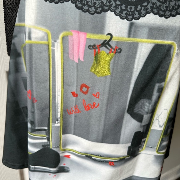 fun unique dress ! slight flare skirt and a sheer back and sleeves. - Picture 4 of 6